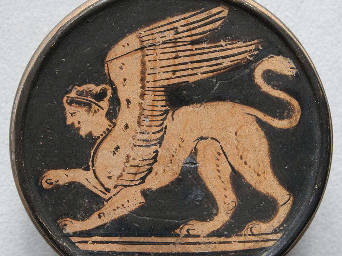 Attic red-figure pyxis with Sphinx