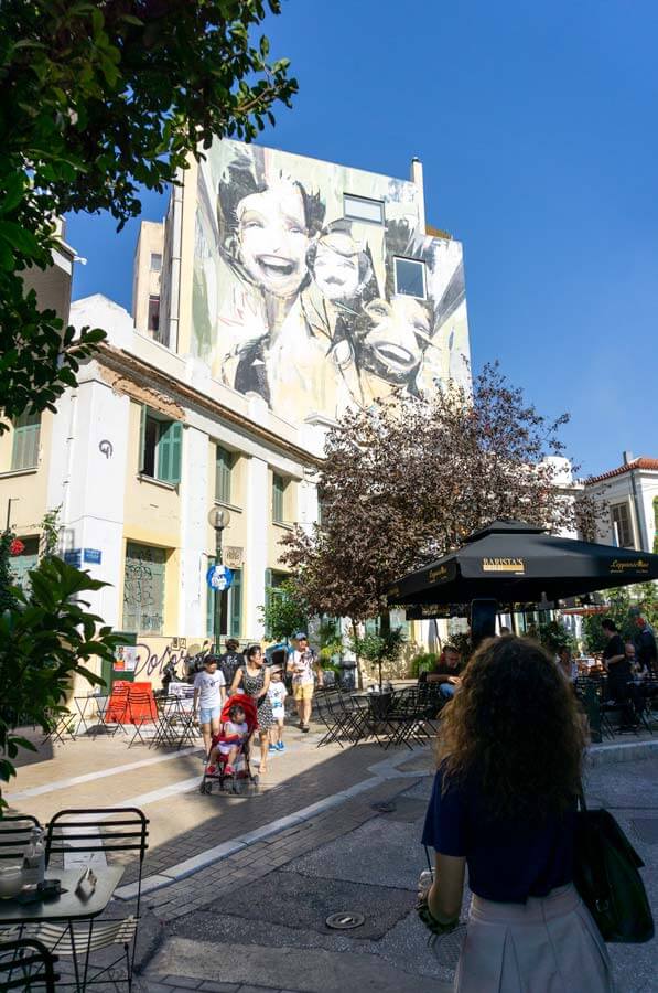 Admiring a work of street art in Athens