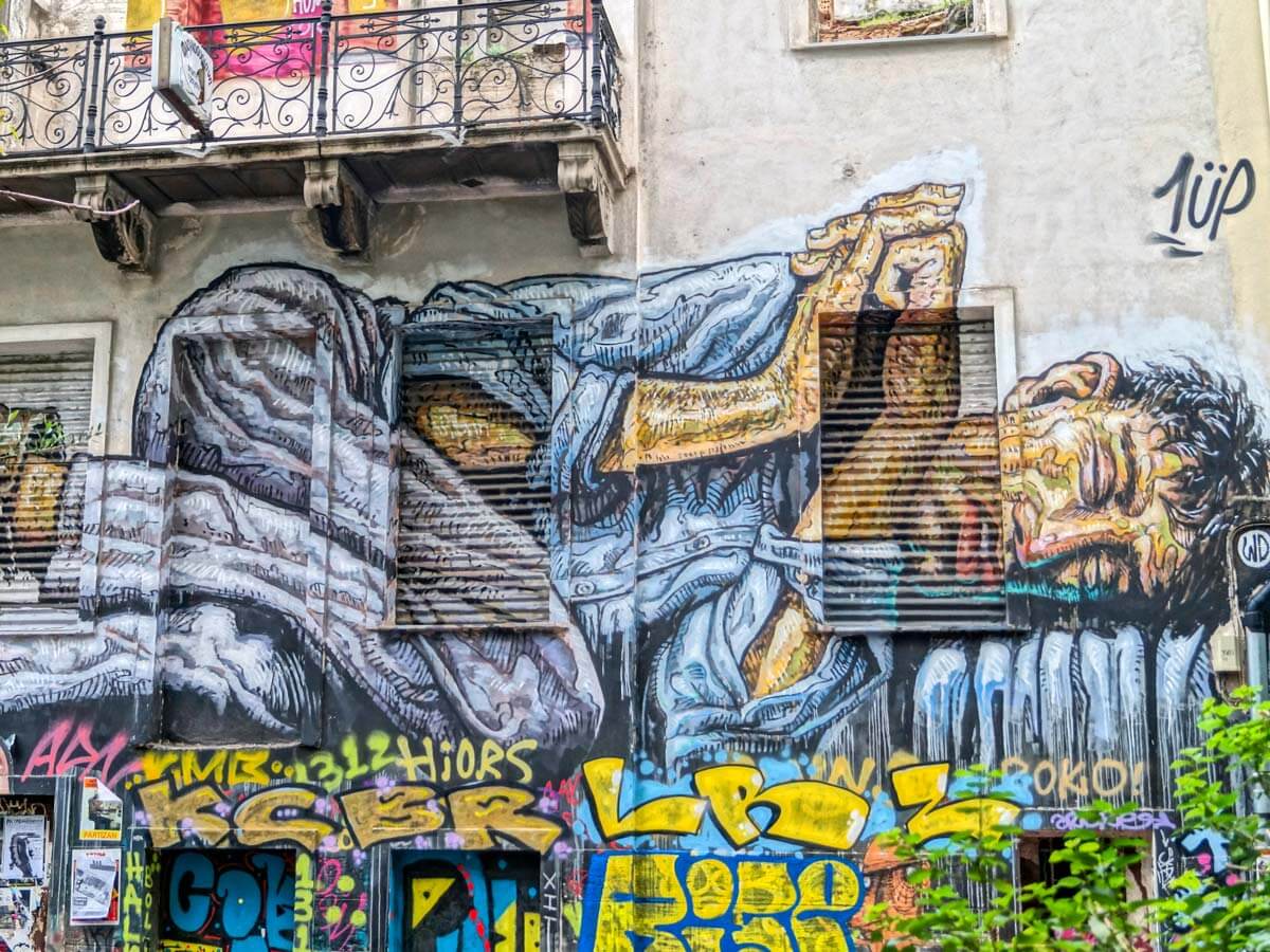 'No land for the poor' mural by street artist WD